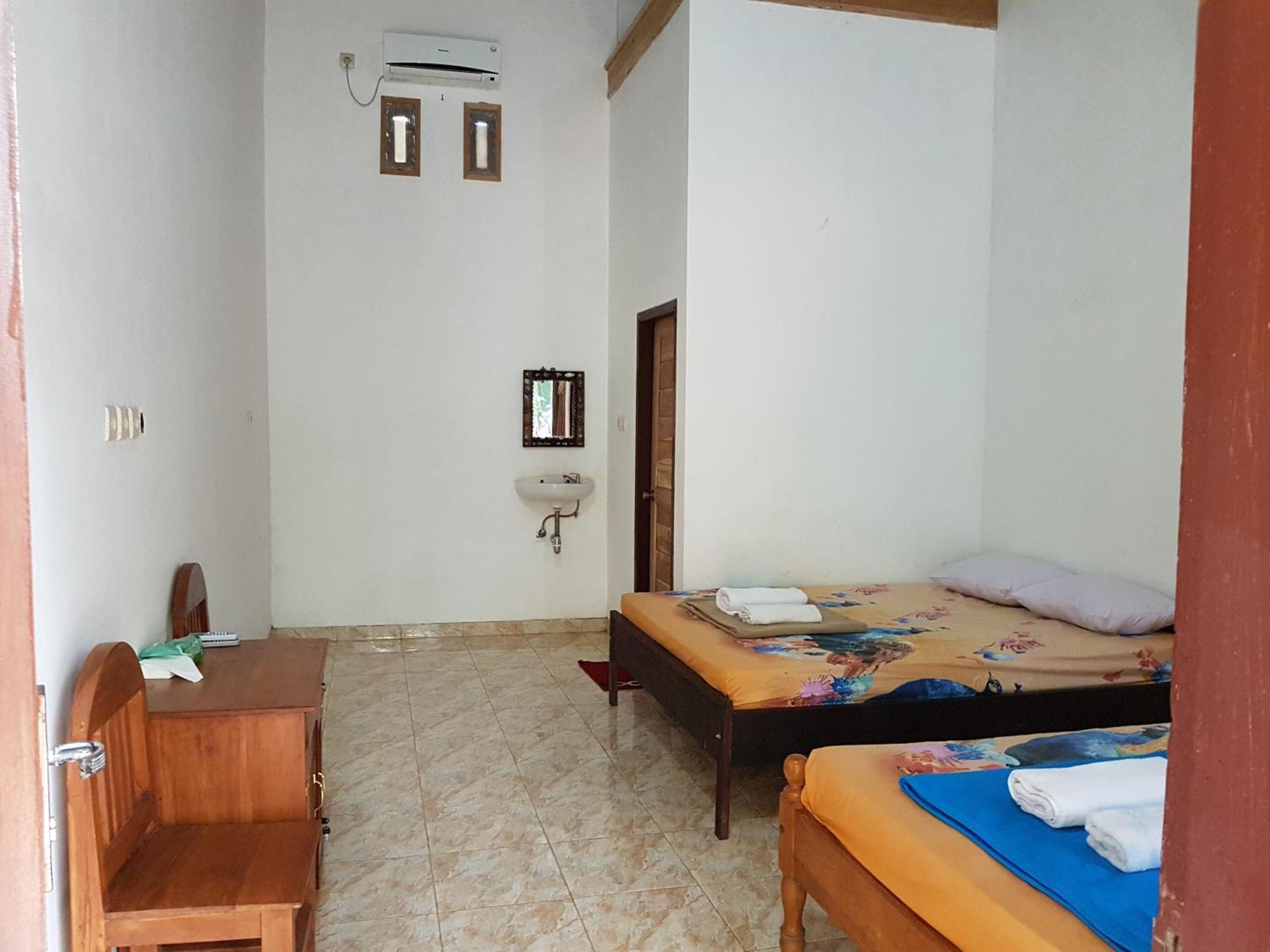 Red Island Bungalows Pasanggaran Quarto foto